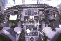 an airplane cockpit with lots of controls